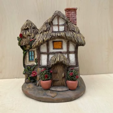 Miniature cottage for fairy garden