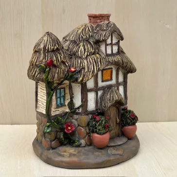 Miniature cottage for fairy garden